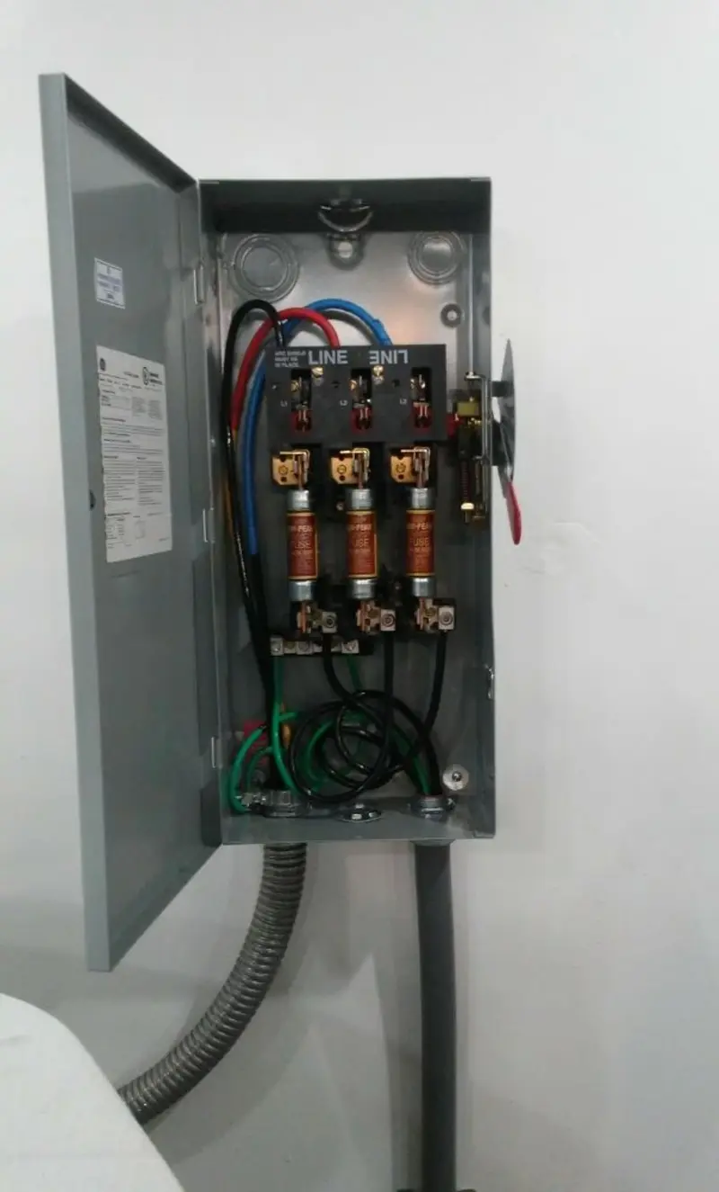 Three-phase disconnect switch installed for Smoke Detector Installation in Woodmoor